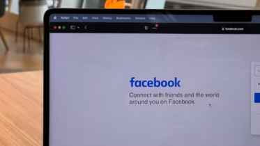 Image of laptop showing facebook page | The Power of Niche Facebook Groups for New Coaches