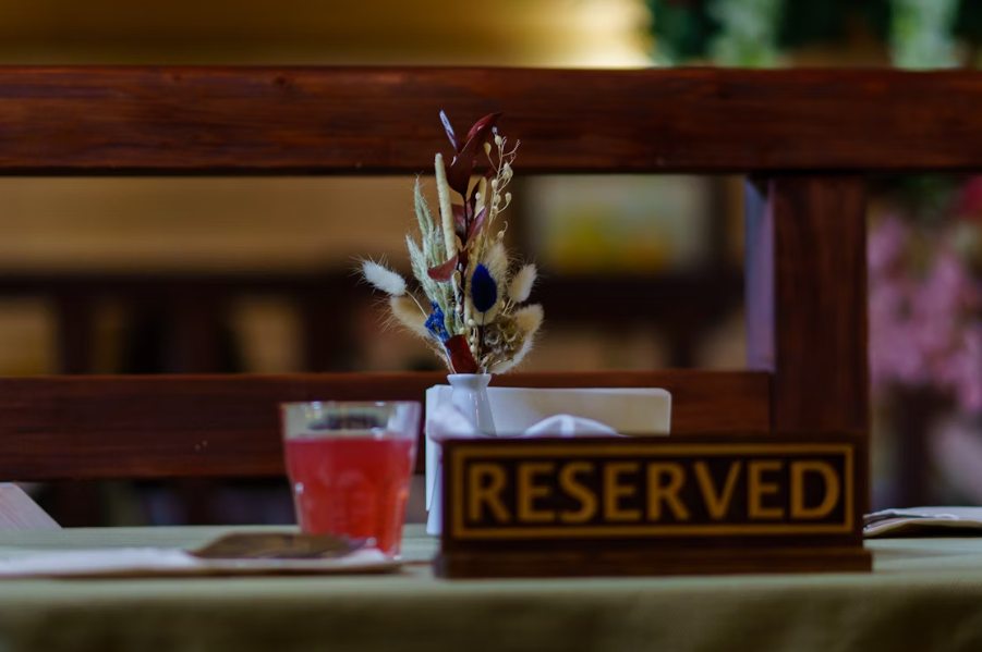 Image of reserved restaurant table | What Successful Coaches Know That Keeps Them Fully Booked