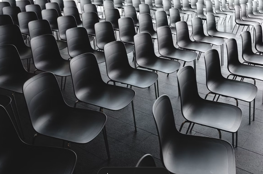 Image of empty chairs | What to Do When Your Audience Isn’t Converting to Clients